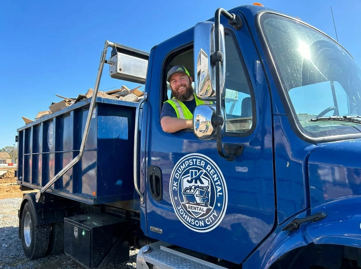 A JK Dumpster Rental driver ready for delivery in Johnson City, TN